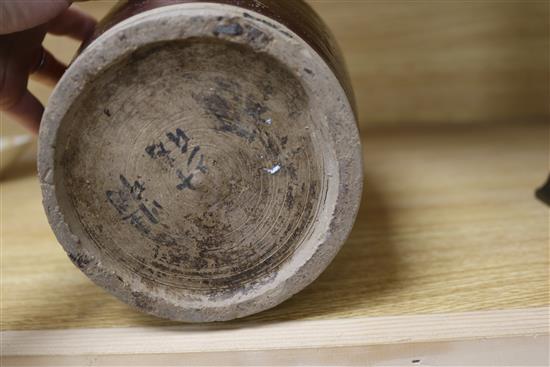 A Chinese late Ming brown glazed spouted jar
